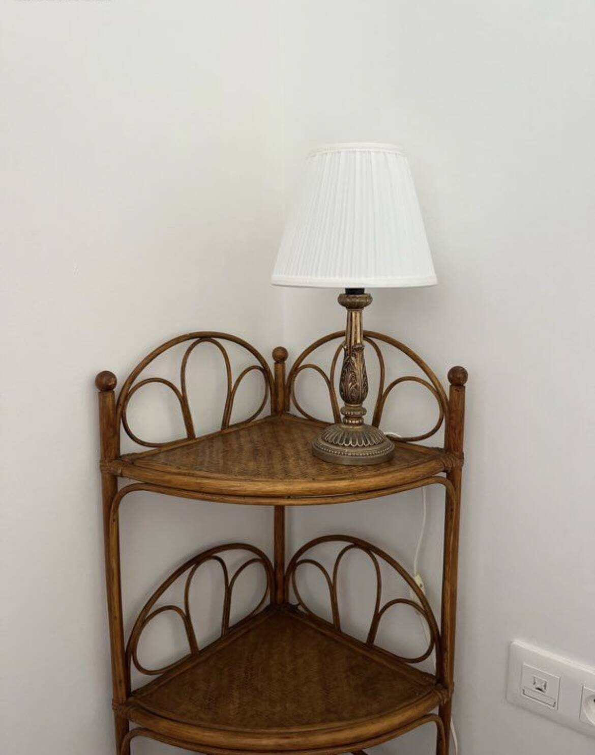 Corner bedside tables in rattan