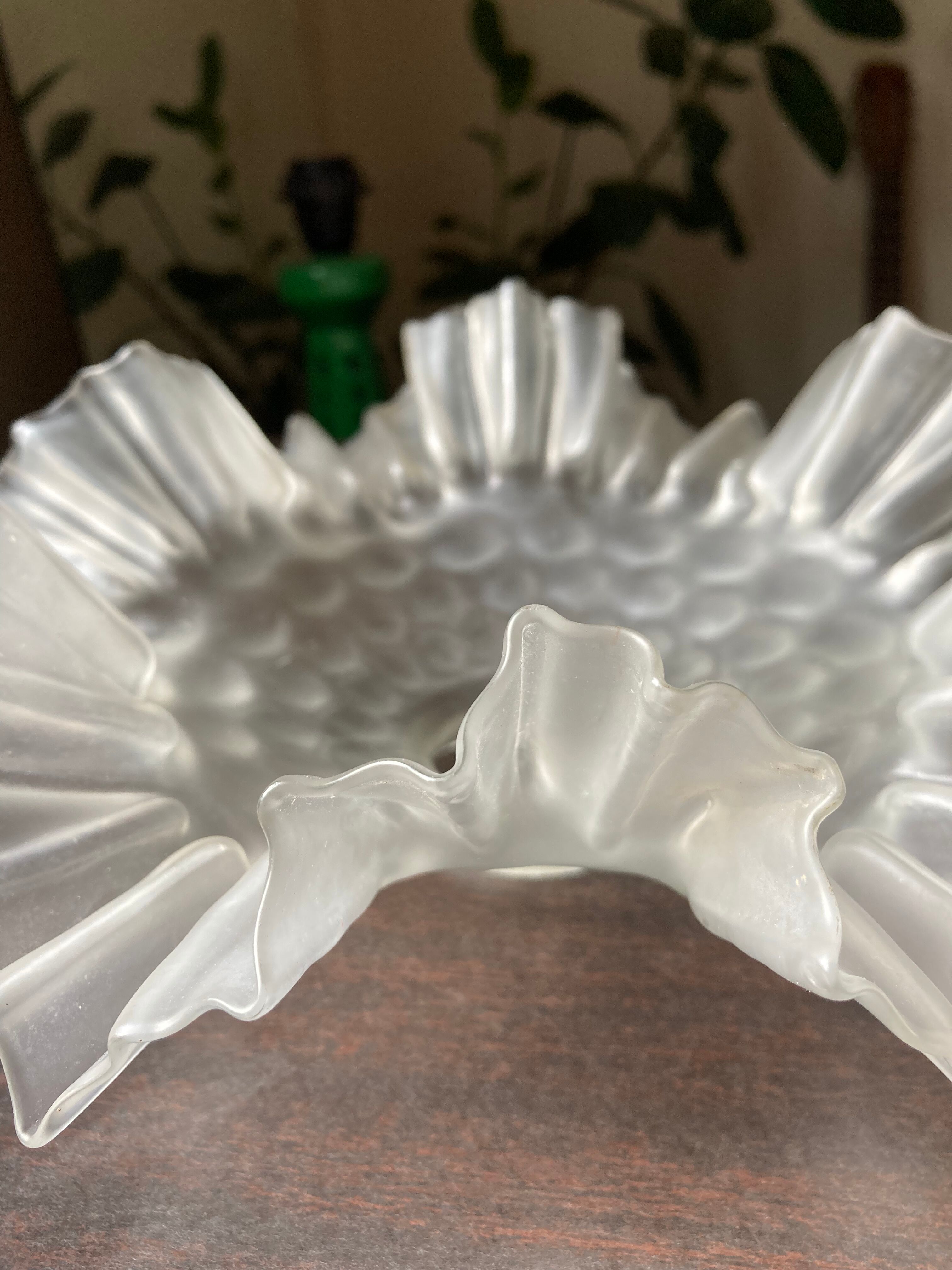 Transparent molded glass suspension in flower shape