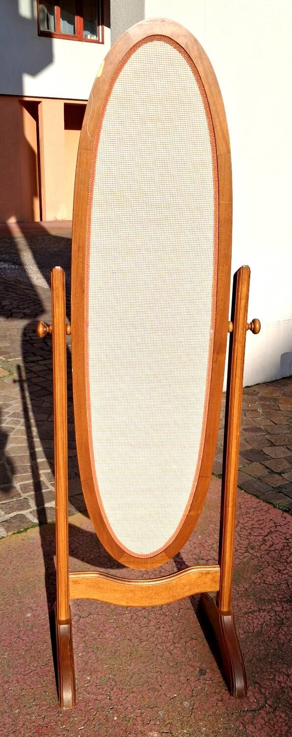 Adjustable full-length mirror for dressing room.