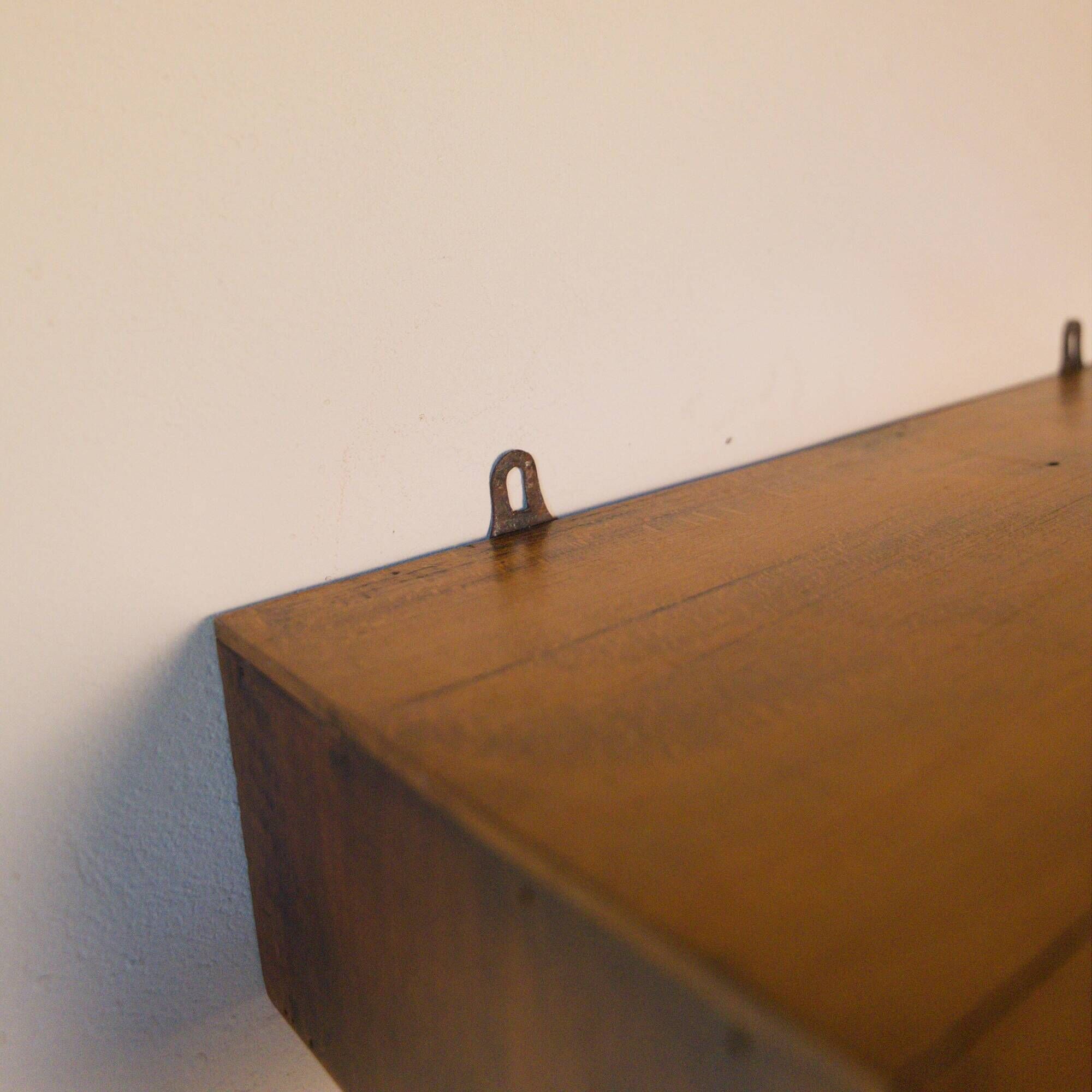 Small vintage wall console in patinated wood with two drawers.