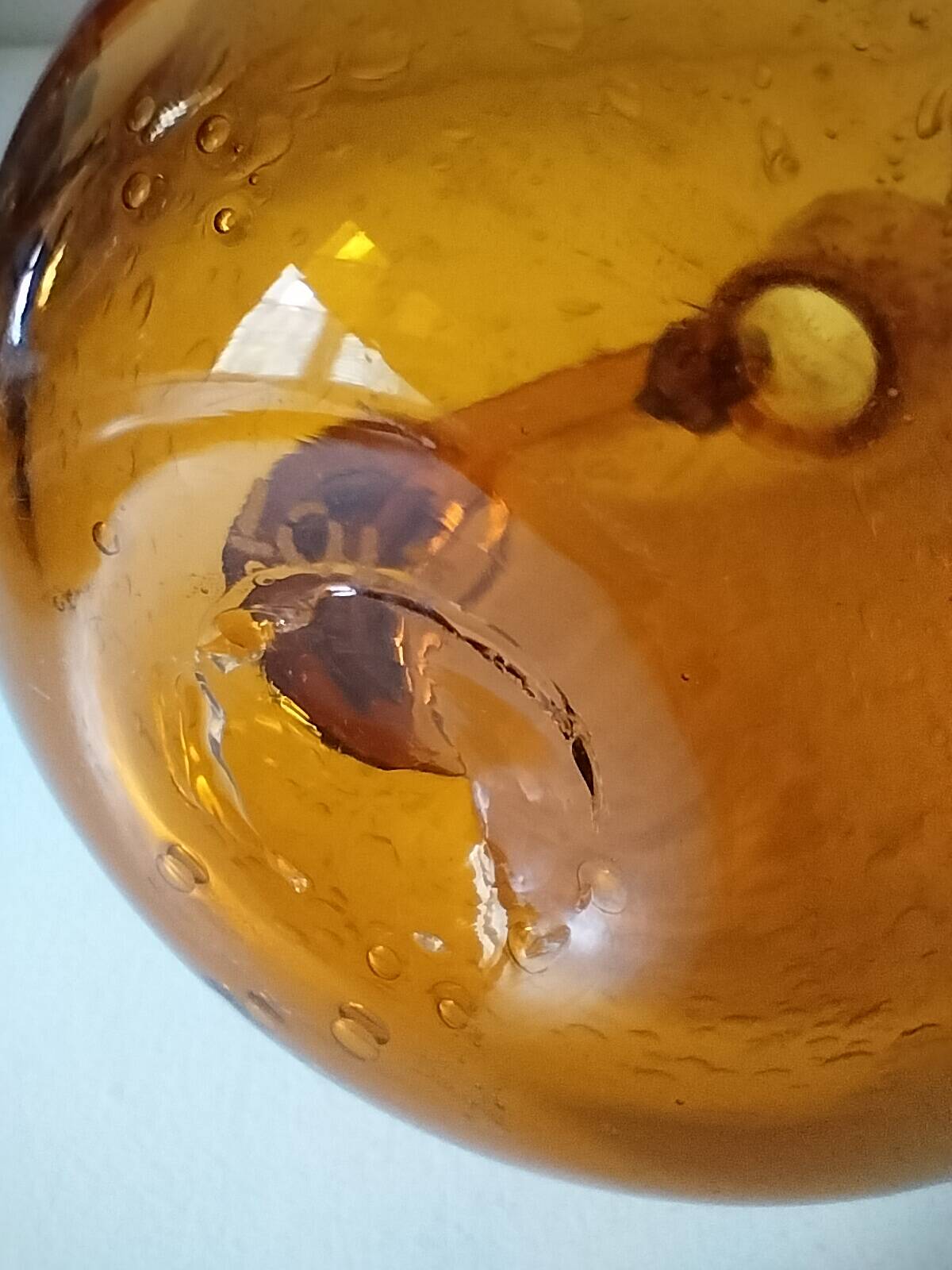 Duo of blown glass carafes – Biot signed – Bubbled amber glass