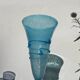 Conical vase in turquoise blue bubbled glass