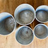 Series of 5 tin spice pots