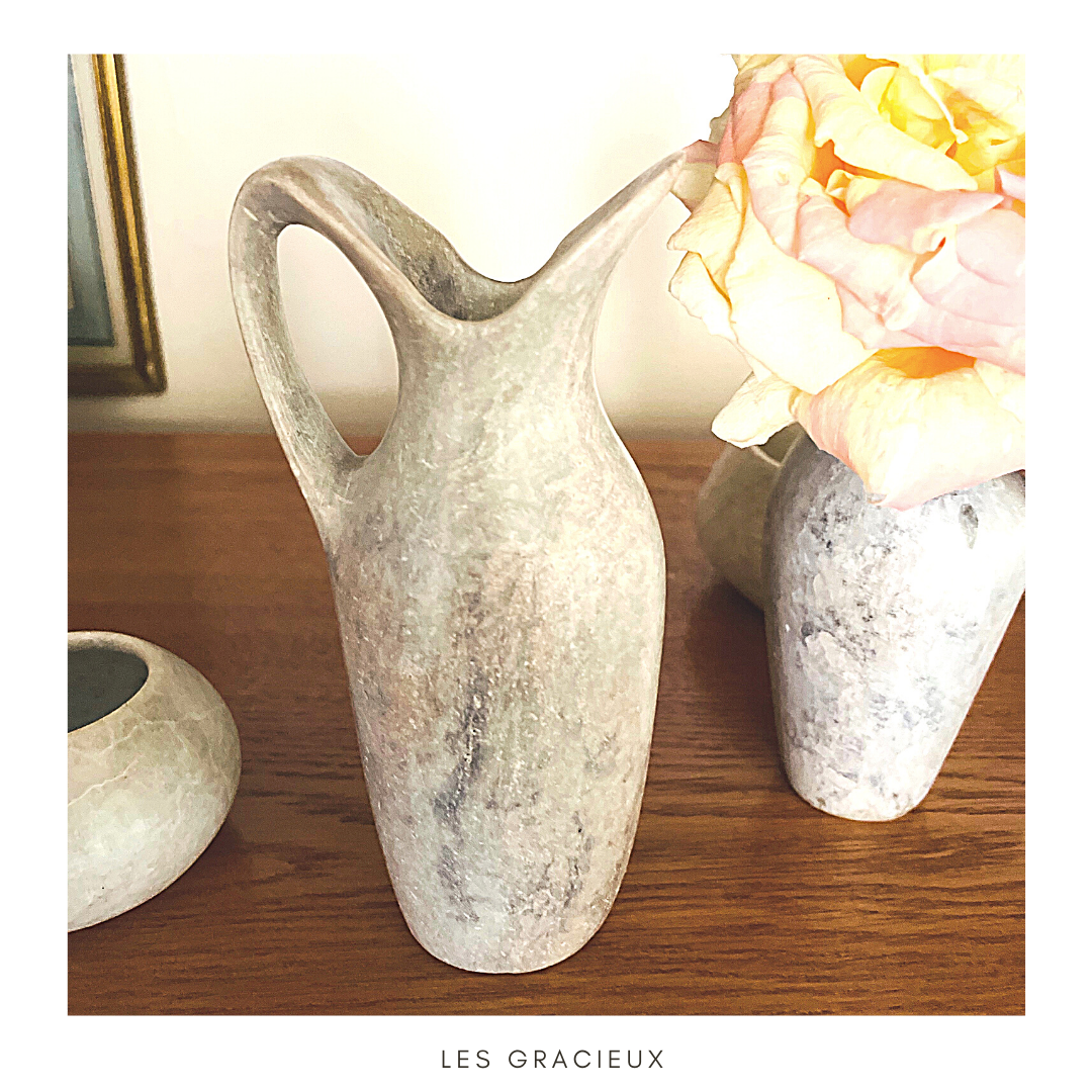 2 jugs in rough cut stone