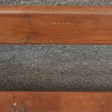 Old wooden bench with cast iron base