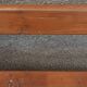 Old wooden bench with cast iron base
