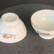 Set of 5 faceted white earthenware bowls with a naive decor, antique