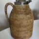 Wicker-covered thermos carafe designed by Ola Olson for Xtra 1980.