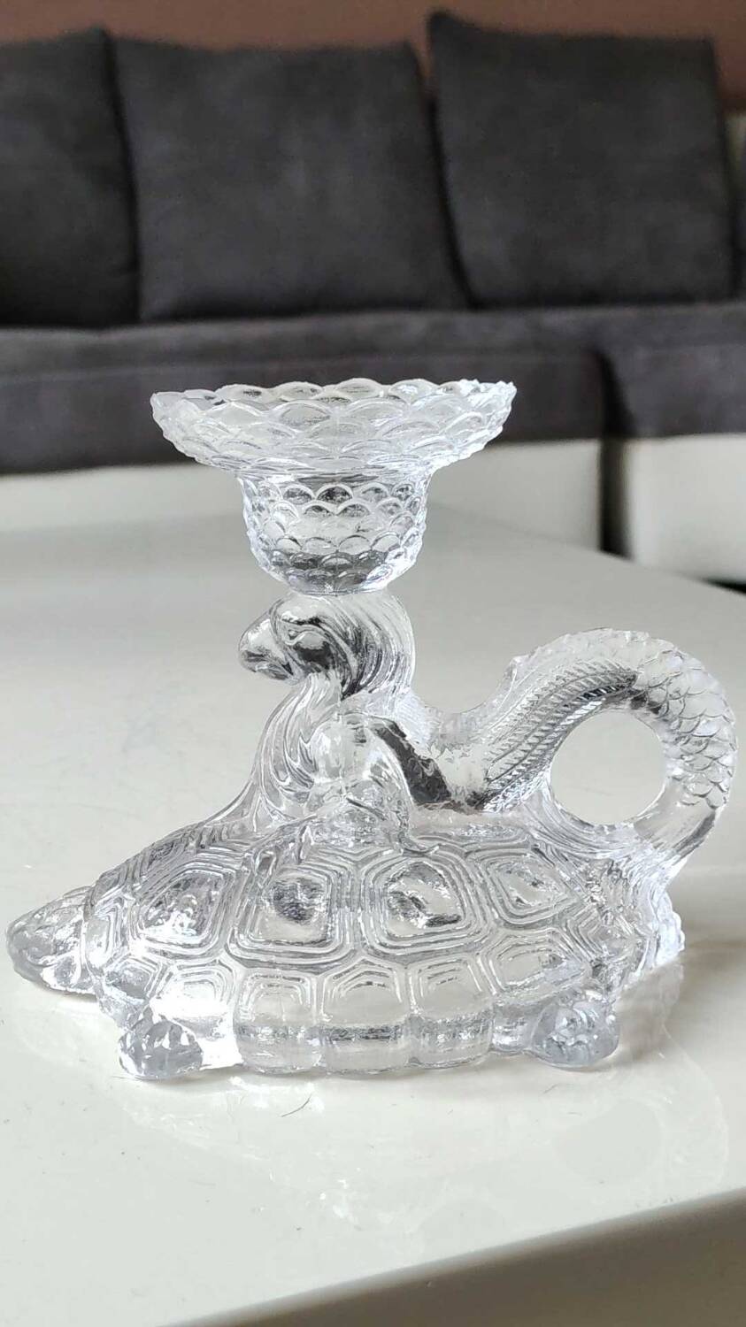 Pair of hand candlesticks/glassware from Portieux/Vallerysthal. In molded glass. Zoomorphic form of turtle carrying a griffin on its back.