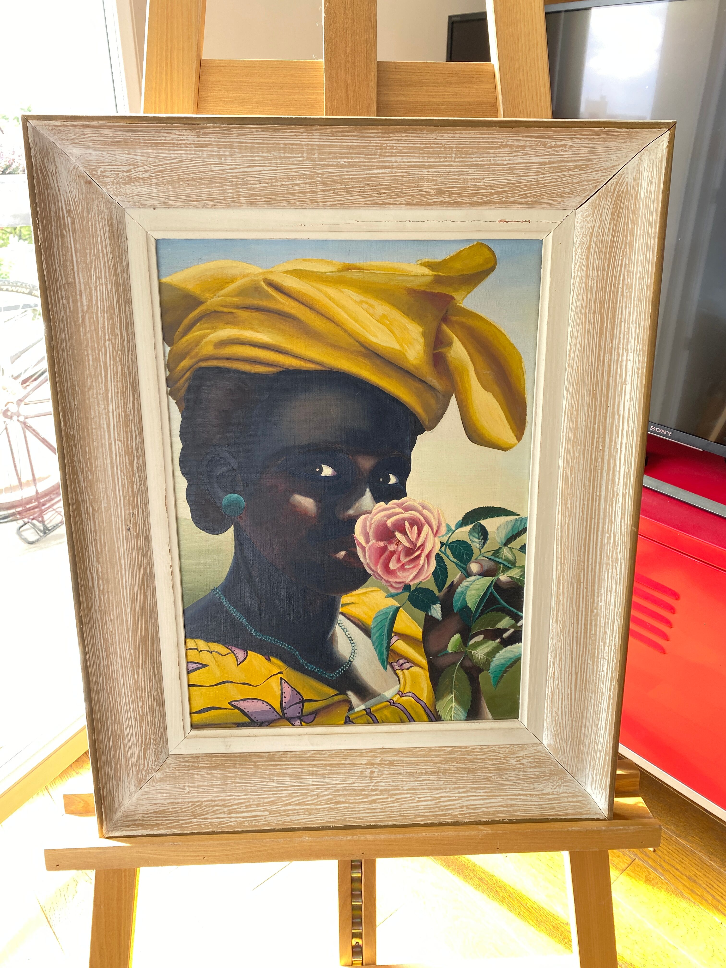 Portrait of a woman with a rose