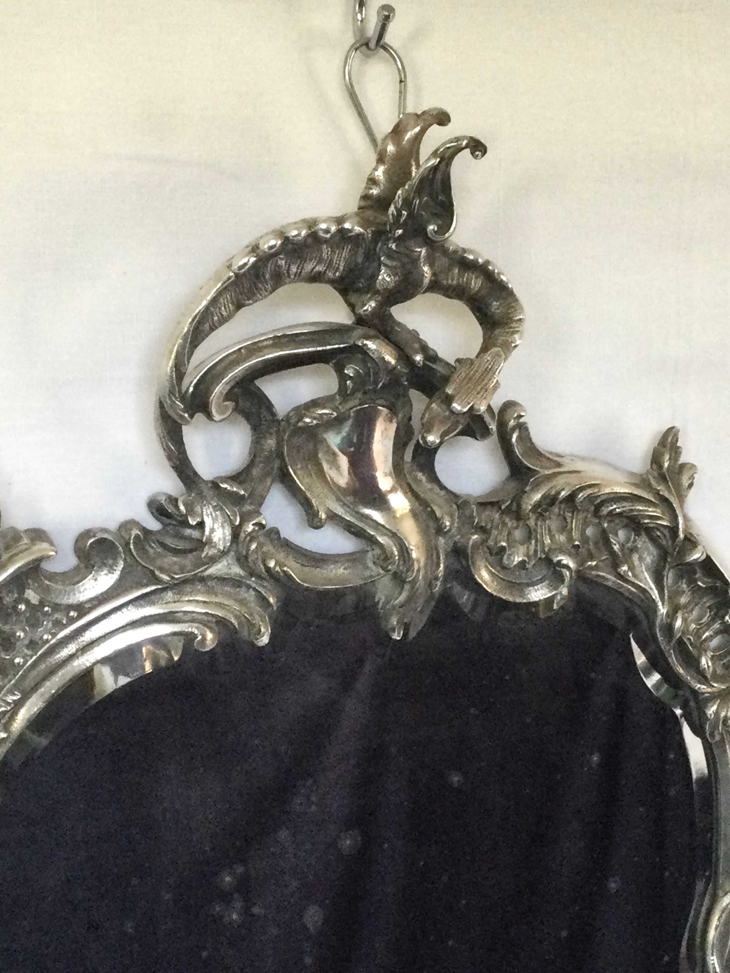 Nineteenth century mirror in silver bronze