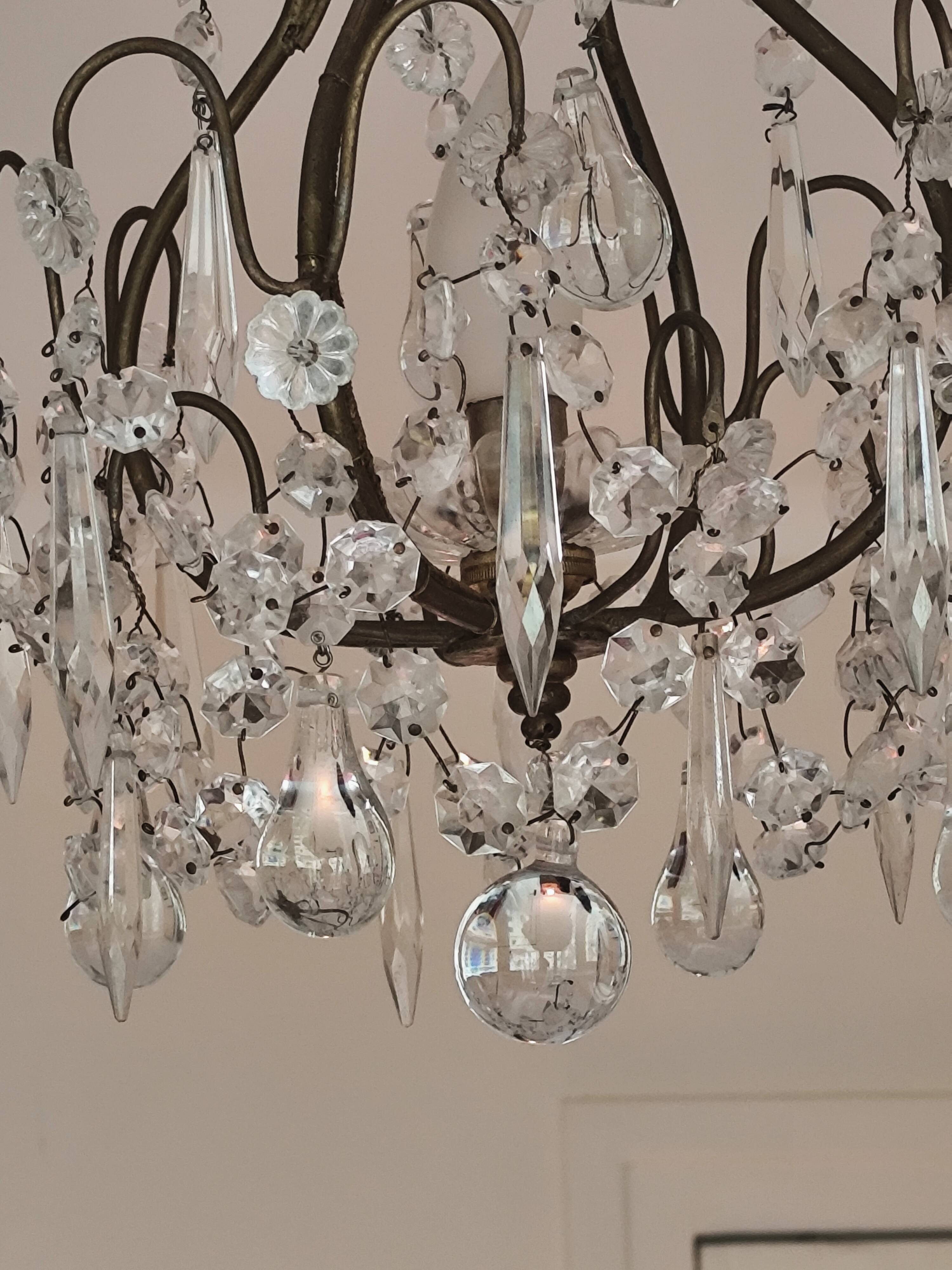 brass cage chandelier with crystal tassels