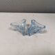 Two beautiful glass candle holders in translucent bluish glass.