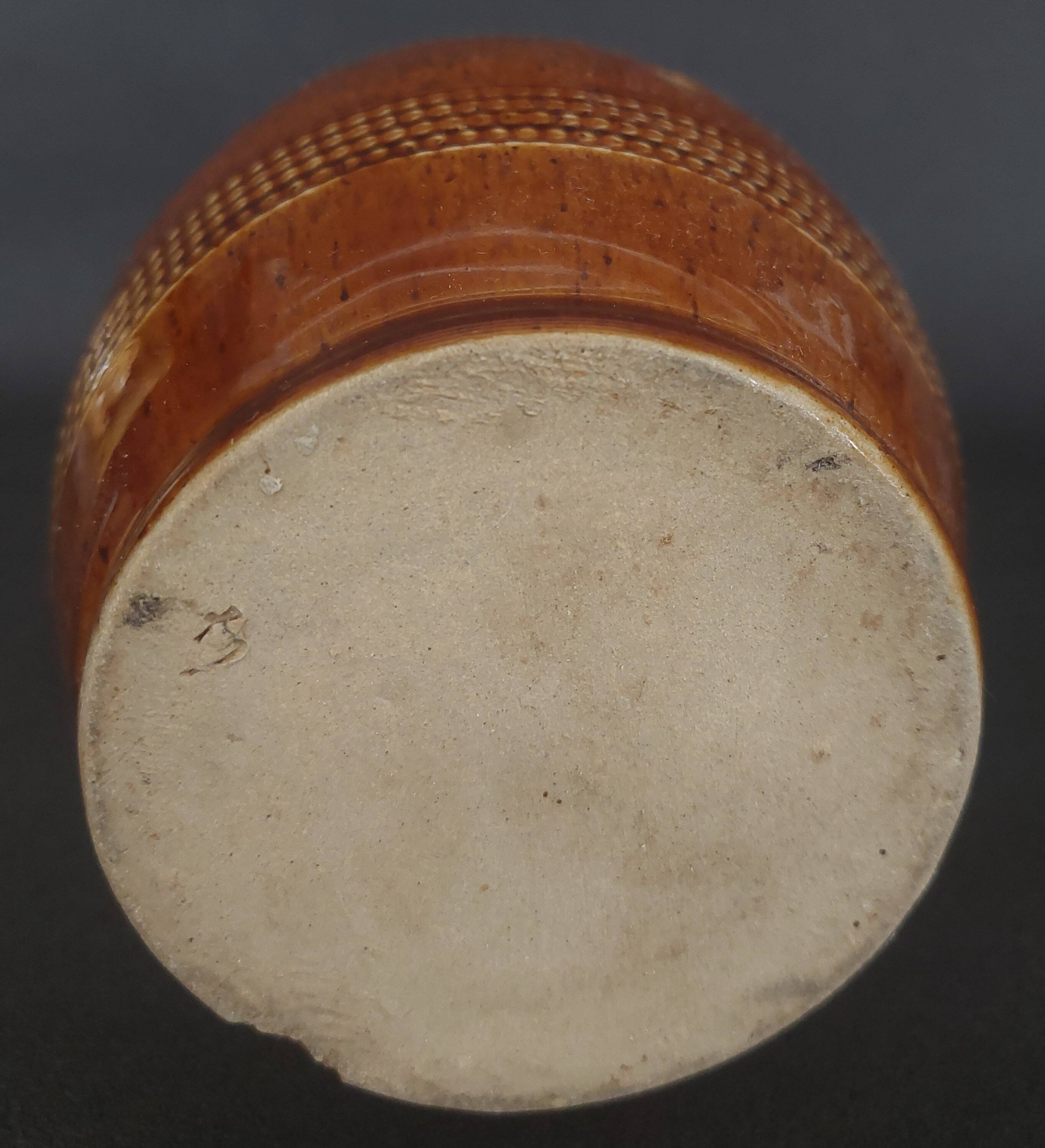 Mid-20th century brown glazed stoneware wine pitcher