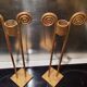 2 golden metal candlesticks