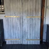 Pair of patinated shutters