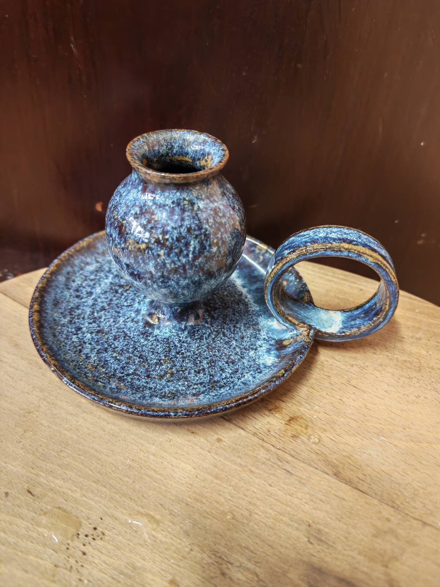 Pair of speckled glazed ceramic candle holders rat of the cellar