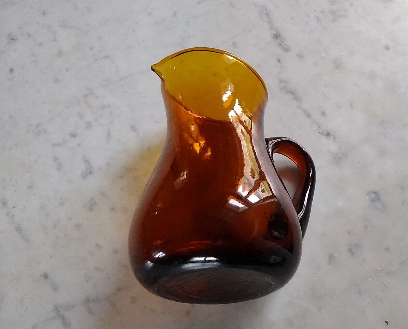 Brown blown glass pitcher