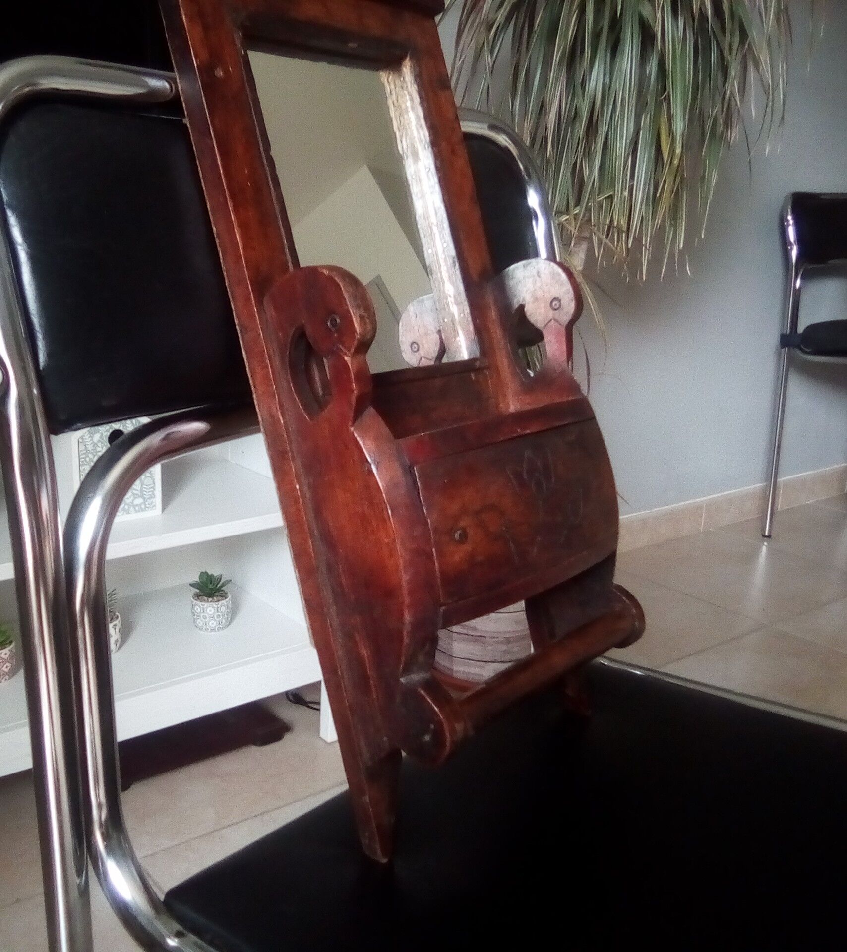 Old art deco barber mirror in teak