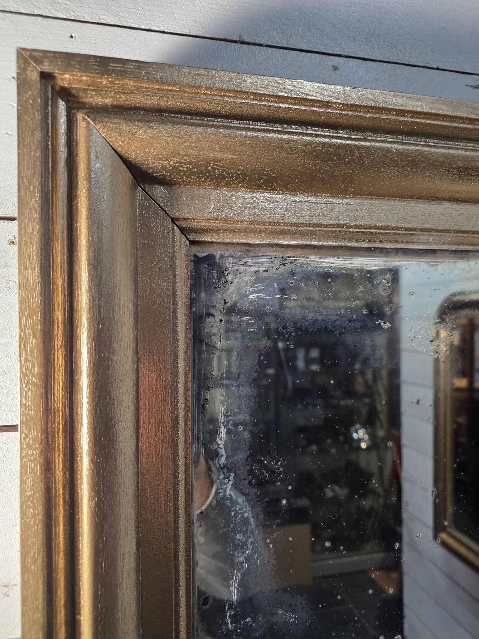 Golden mirror in oak from the 19th century.