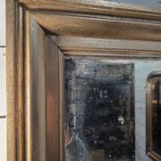 Golden mirror in oak from the 19th century.