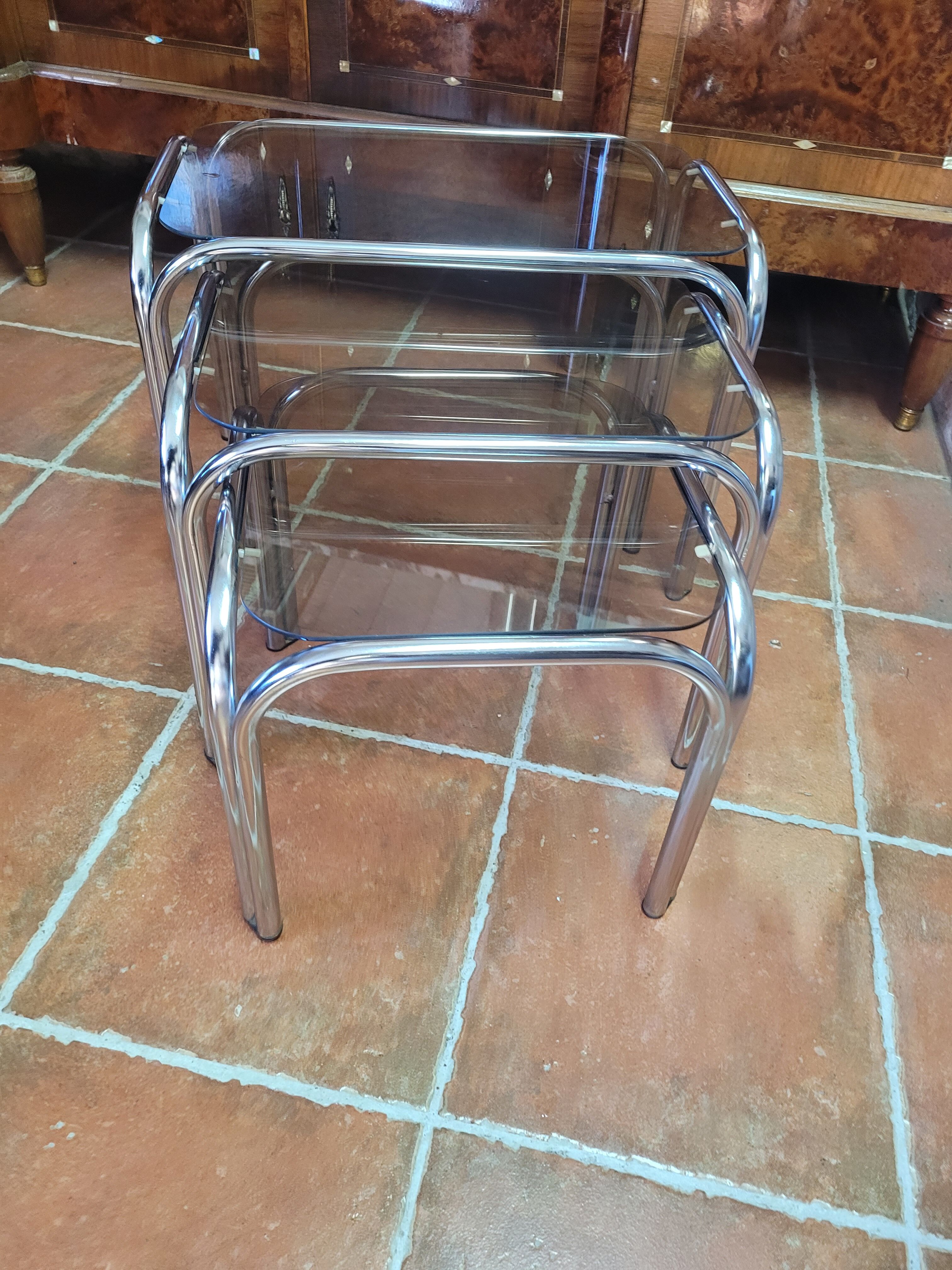 Chrome nesting table with smoked glass top from the 70s