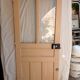 Old glazed door with its shutter