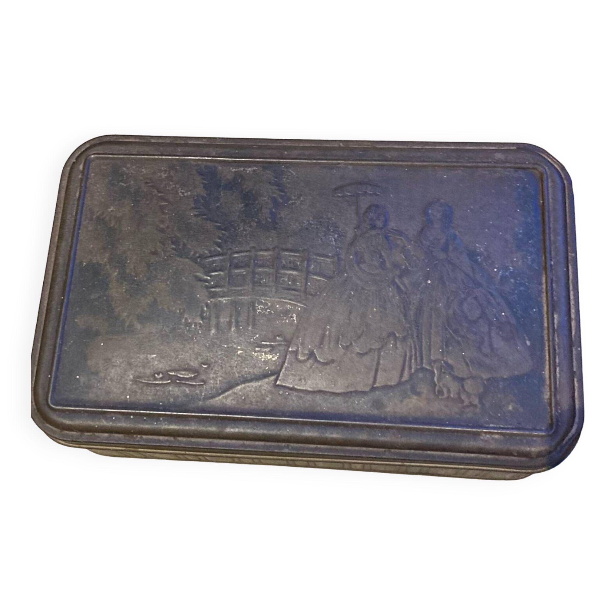 Cake tin from the early 20th century with embossed designs
