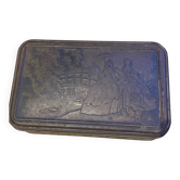 Cake tin from the early 20th century with embossed designs