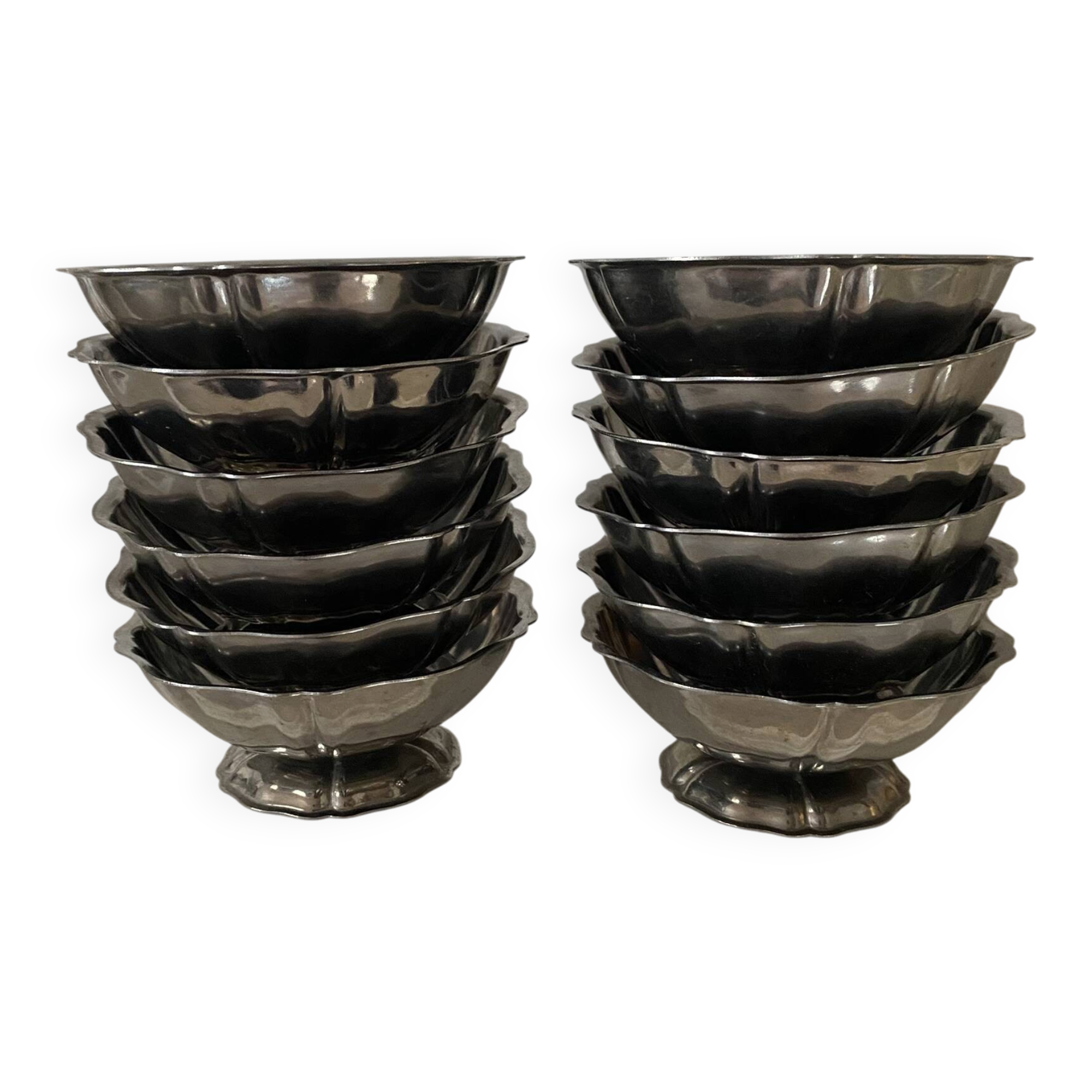 Stainless steel ice cream bowls for one scoop.