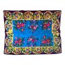 Floral wool vintage rug on blue and yellow background made by hand in Transylvania