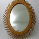 Mirror rattan oval radiating around 1960  - 37x50cm