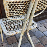 Perforated metal chairs René Malaval 1950