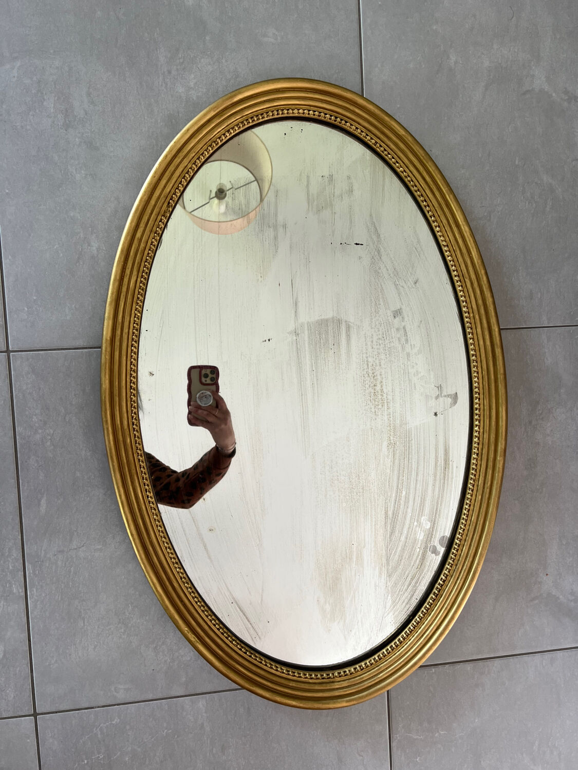 Vintage oval gold mirror