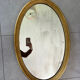 Vintage oval gold mirror