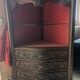 Antique corner cabinet in Louis XV style, topped with a marble surface.