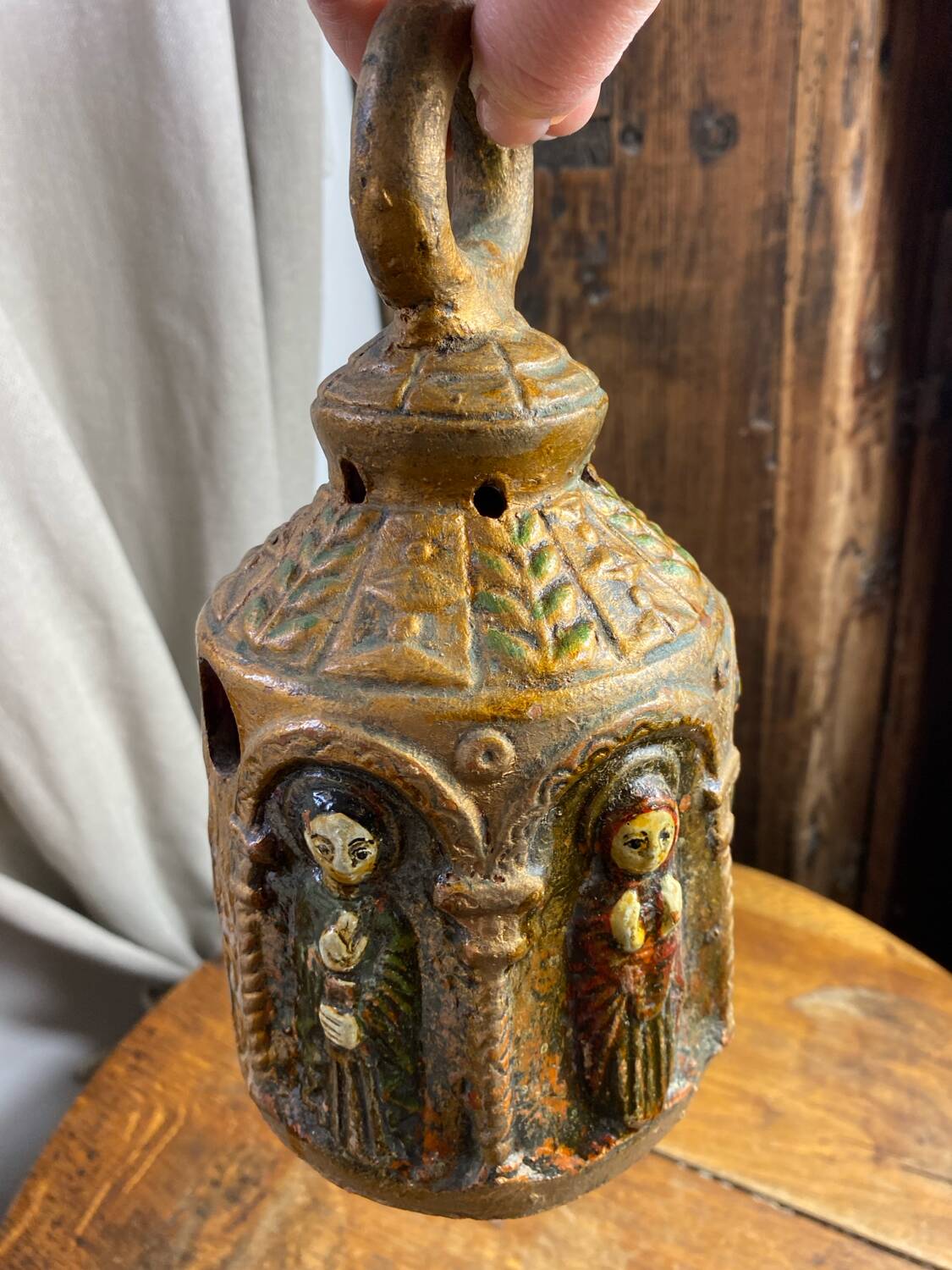 Ceramic lanterns, decorated with religious icons.