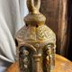 Ceramic lanterns, decorated with religious icons.