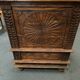Meuble en bois sculpté