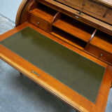 Cylinder desk with marquetry featuring a crosshatch design.