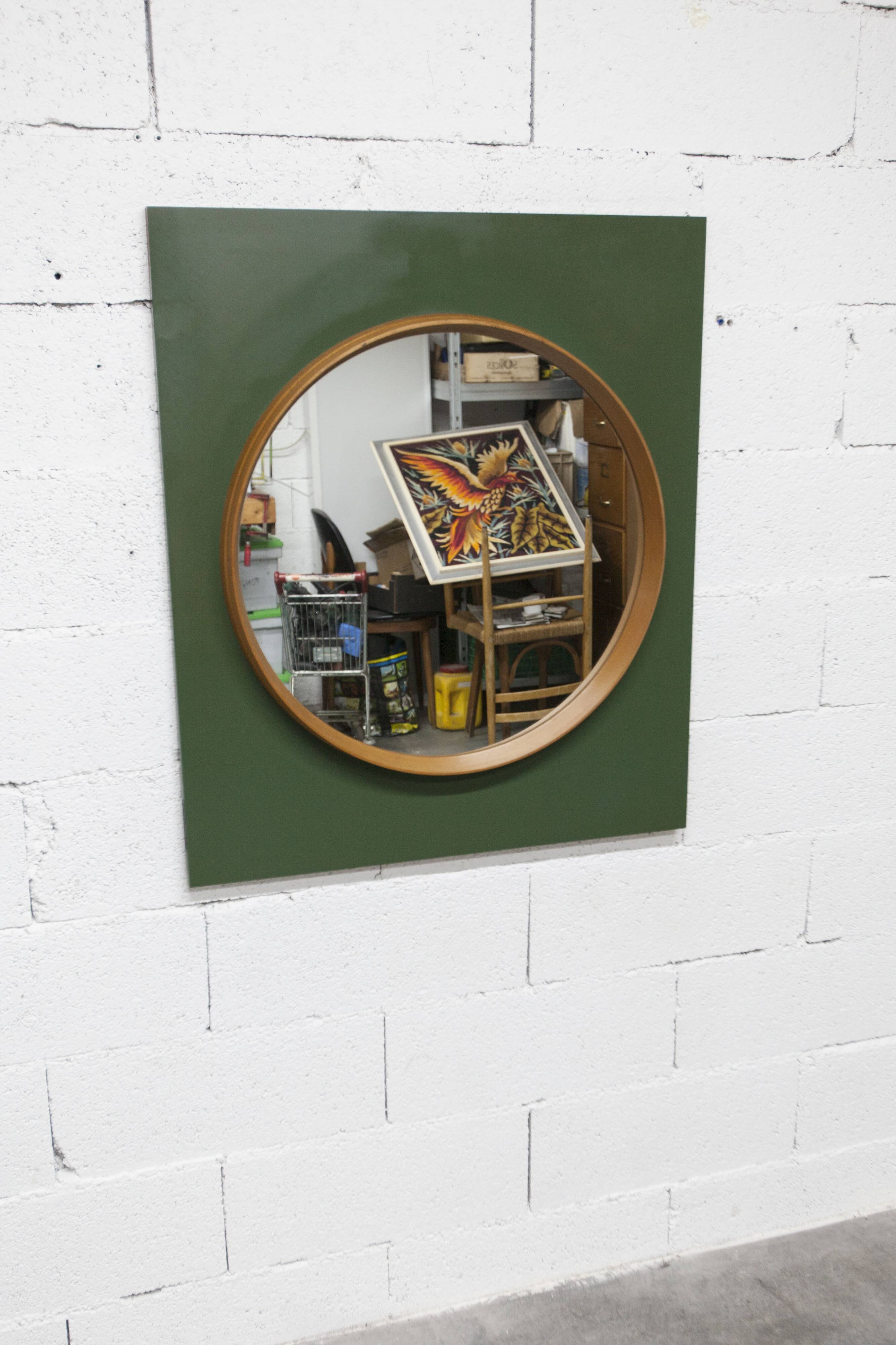 Unusual round wall mirror 60 cm teak edge on green rectangular board 1960.