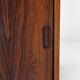 Low sideboard in rosewood with sliding doors. Denmark, 1960s