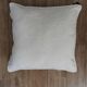 Coussin bouclette blanc cassé