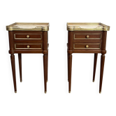 Pair of mahogany and brass side tables or bedside tables with Carrara marble tops.