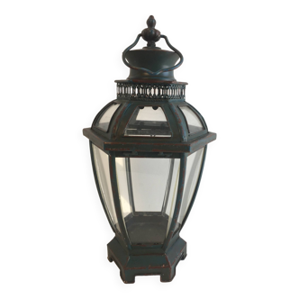 Retro vintage lantern in aged green metal