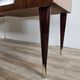 Mid-century drawer chest in mahogany, brass and glass.