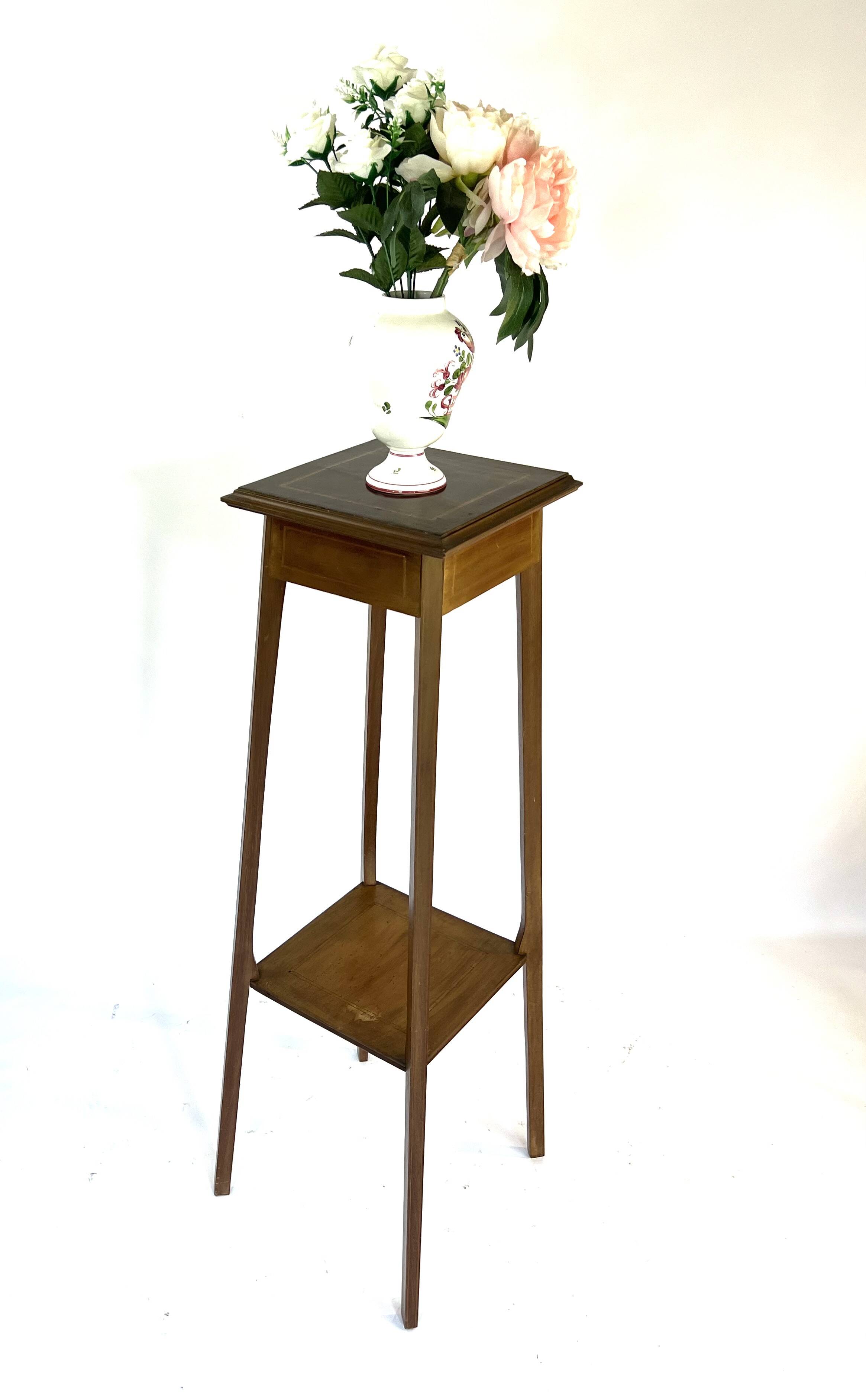 Large wooden pedestal table