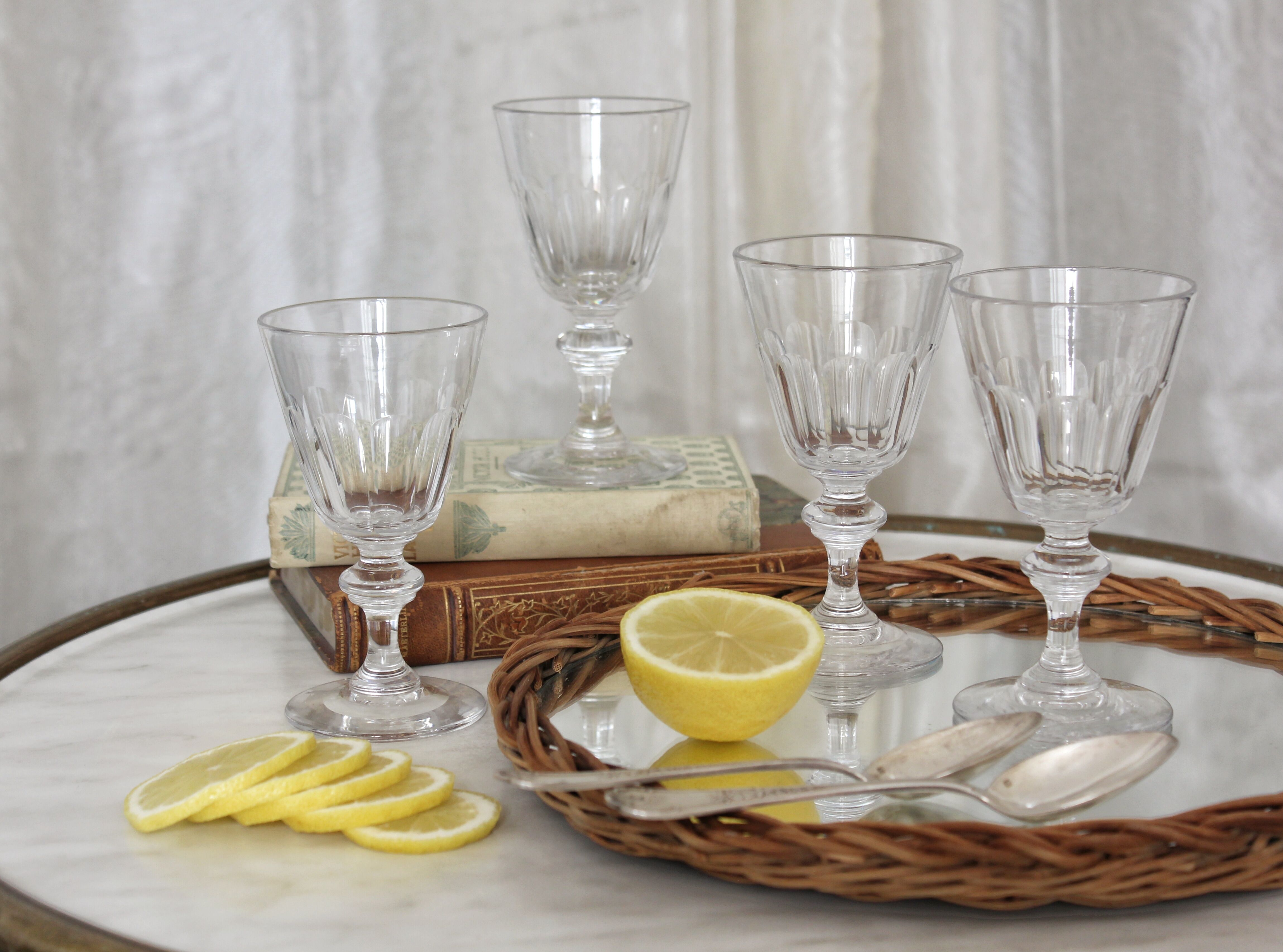 4 glasses with white wine in crystal ringing the nineteenth