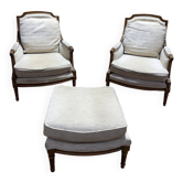 Paire de fauteuil / bergères de style Louis XVI beige