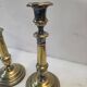 Paire de bougeoirs anciens en laiton